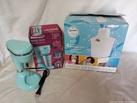 Rival electric ice cream maker boxed next to Brentwood milkshake maker