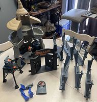 Photo showing the entire Jurassic Park Command Compound set on a table, including the tower, gate, fences, control box, and accessories.