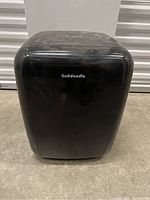 Front view of the Solidoodle 3D printer with the logo visible on the front curved transparent cover.