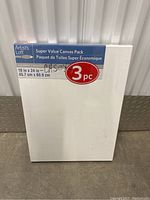 Front view of sealed pack containing 3 blank canvases, labeled 'Super Value Canvas Pack 3 pc' with dimension 18 x 24 in