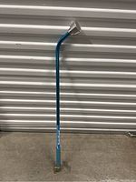 Full view of the Waterwand water wand showing the full length and curved metal nozzle.