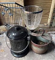 Full group showing ceramic compost bucket, glass vase, metal basket and copper pot