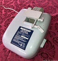 Top view of Mastercraft Wet Sharpener showing the grinding wheel, tool rest and product label with electrical and model info.