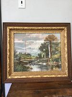 Front view of the antique framed print showing the full scene and ornate frame.