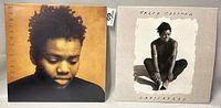 Both Tracy Chapman vinyl record albums shown side by side: self-titled debut and Crossroads.