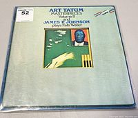 Front cover of vinyl album sleeve showing Art Tatum Masterpieces Volume II and James P Johnson plays Fats Waller, with artwork and titles.