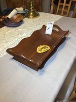 Full view of the Gibbard cherry wood fruit tray showing the curved sides and Gibbard patch on the tray base.