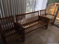 Front view of two chairs and sofa arranged side by side
