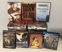 Photo showing key front covers including 3:10 to Yuma, Dawn of the Dead, Man on Wire, Four Brothers, Mulholland Dr., and others.