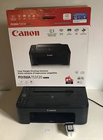 Original box of Canon Pixma TS3120 printer, showing branding, model and features.