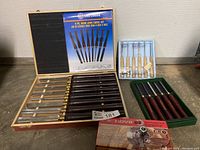 Complete lot layout showing all chisel sets and Nova chuck