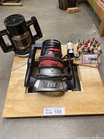 Craftsman Sears EVS router with assorted router bits on wooden board, showing overall lot contents.