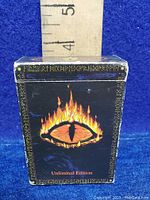 Box showing the Eye of Sauron flame artwork and indicating unlimited edition.