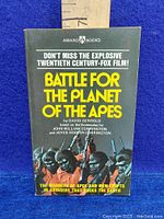 Front cover of the book showing title, author, and image with ruler for size reference.