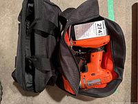 Photo showing black carrying cases side by side on the floor.