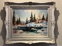 Full view of painting in ornate white decorative frame