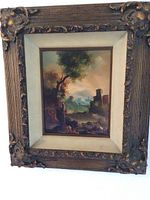 First oil painting with ruins and trees in ornate gilt wood frame