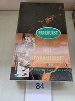 Front view of the sealed box showing the Parkhurst logo, series, NHL branding, and hockey player images on the front with orange and black coloration.