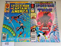 Front view of Marvel Team-Up #106 and #115 comics showing cover art and price (50 cents and 60 cents respectively).
