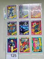 Front view of nine 1990 Impel Marvel trading cards featuring super-villains and rookies arranged in a 3x3 grid.