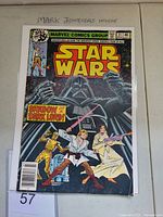Front cover of Star Wars #21 Marvel comic book showing main characters and title