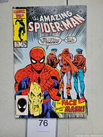 Front cover of The Amazing Spider-Man #276 featuring Spider-Man holding a Hobgoblin mask and three figures in the background. Price 75 cents, May issue.