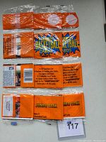 Three unopened 1994/95 Fleer Basketball Series 2 rack packs laid flat on a surface for display.