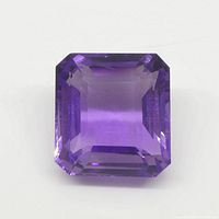 Close-up front view of a rectangular purple amethyst gemstone showing clarity and faceted cuts.