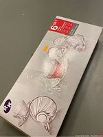 Box packaging showing 6 clear glass teacups with matching saucers, brand RK, product image and quantity indication.