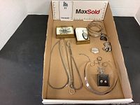 Tray overview with entire assortment of silver jewelry pieces
