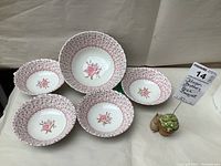 Set of five Johnson Brothers Rose Bouquet bowls, one large and four smaller dessert bowls.
