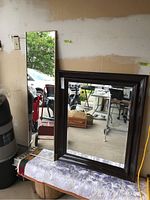Photo showing both mirrors side by side with the full-length mirror on the left and rectangular mirror on the right