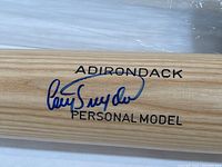 Closeup of the autograph of Cory Snyder on the barrel of the bat with Adirondack Personal Model branding.