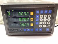 Front view of the Mitutoyo KLL Counter powered on showing digital readouts and numeric keypad.