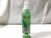 Front view of the Garnier SkinActive Balancing Facial Mist bottle showing branding and spray nozzle.