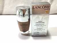 Full view of Lancôme Teint Visionnaire Makeup Duo bottle and original box showing product information and packaging.