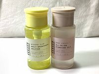 Front view of the two Versed bottles showing labels and product colors.