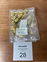 We see two transparent plastic bags containing 10 gold-plated banana plugs each, labeled with PROVO, model A269G, lot of 10 pieces per bag.