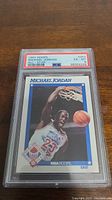 1991 Hoops Michael Jordan #253 basketball card, graded PSA 6, showing front of card with Jordan dunking in an NBA All-Star jersey.
