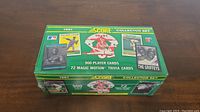 Front and top view of sealed 1991 Score Baseball collector set box on wooden surface.