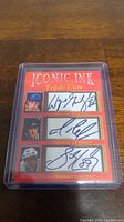 Front view of facsimile autograph card encased in protective plastic showing signatures and images of Wayne Gretzky, Mario Lemieux, and Sidney Crosby.