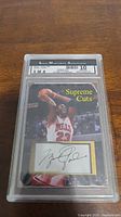 Michael Jordan Supreme Cuts SMA 10 facsimile autograph card graded 10 by SMA, encased.