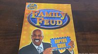 Front of Family Feud 5th Edition game box with host image.
