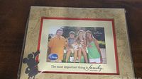 Full view of the Hallmark Walt Disney 4x6 frame showing a family photo placeholder, Mickey Mouse cutout, and 'family' quote.