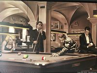 Close-up view of the photographic print showing Marilyn Monroe, Humphrey Bogart, James Dean, and Elvis Presley playing pool in a bar.