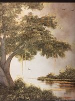 Close-up of canvas texture and gold metallic accents on tree foliage.