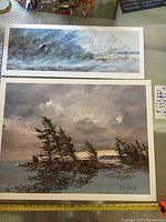 Two Edwin Mathews lithographs shown together, one narrow and panoramic, the other larger and square-like.