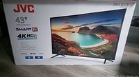 Original retail box front view showing JVC branding, 43" size, Smart TV, 4K HDR, Select Series