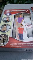 Box of Magna Screen magnetic mesh screen door showing product in use by family, highlighting hands-free entry and pet access.