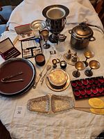 Overall arrangement showing all items on tablecloth